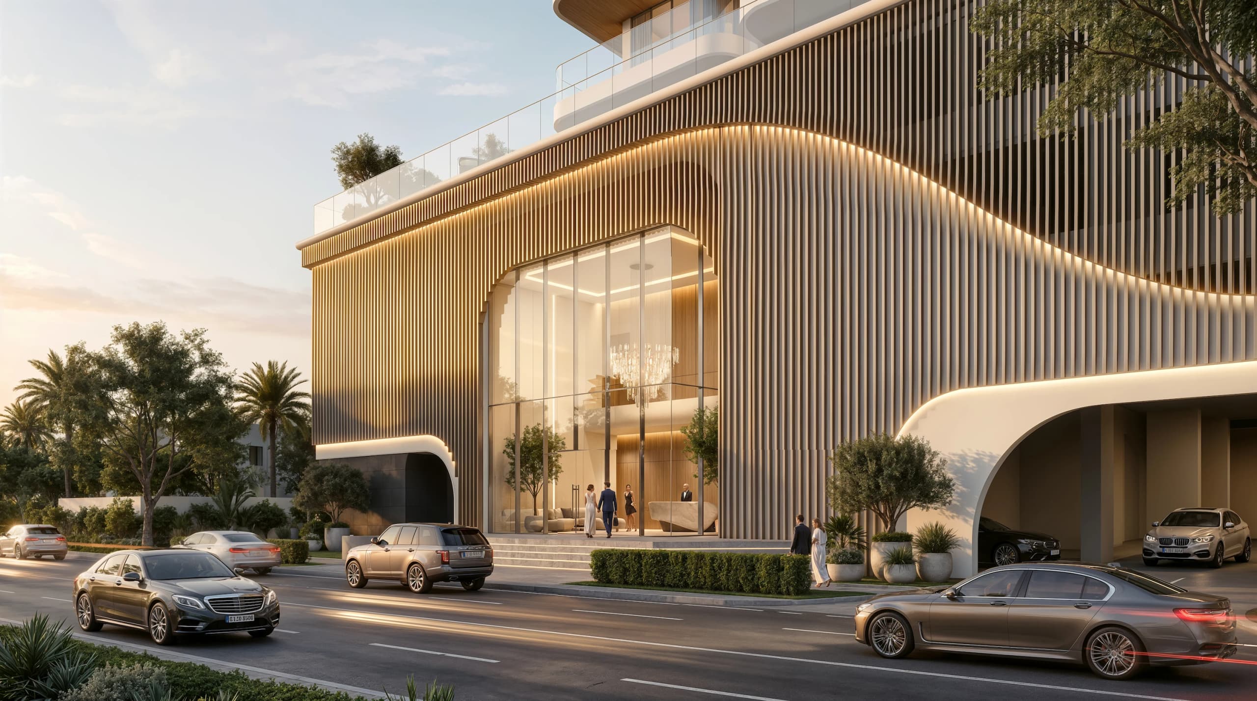 Curved vertical timber fins and a glazed entrance lobby at street level, traced by a line of light