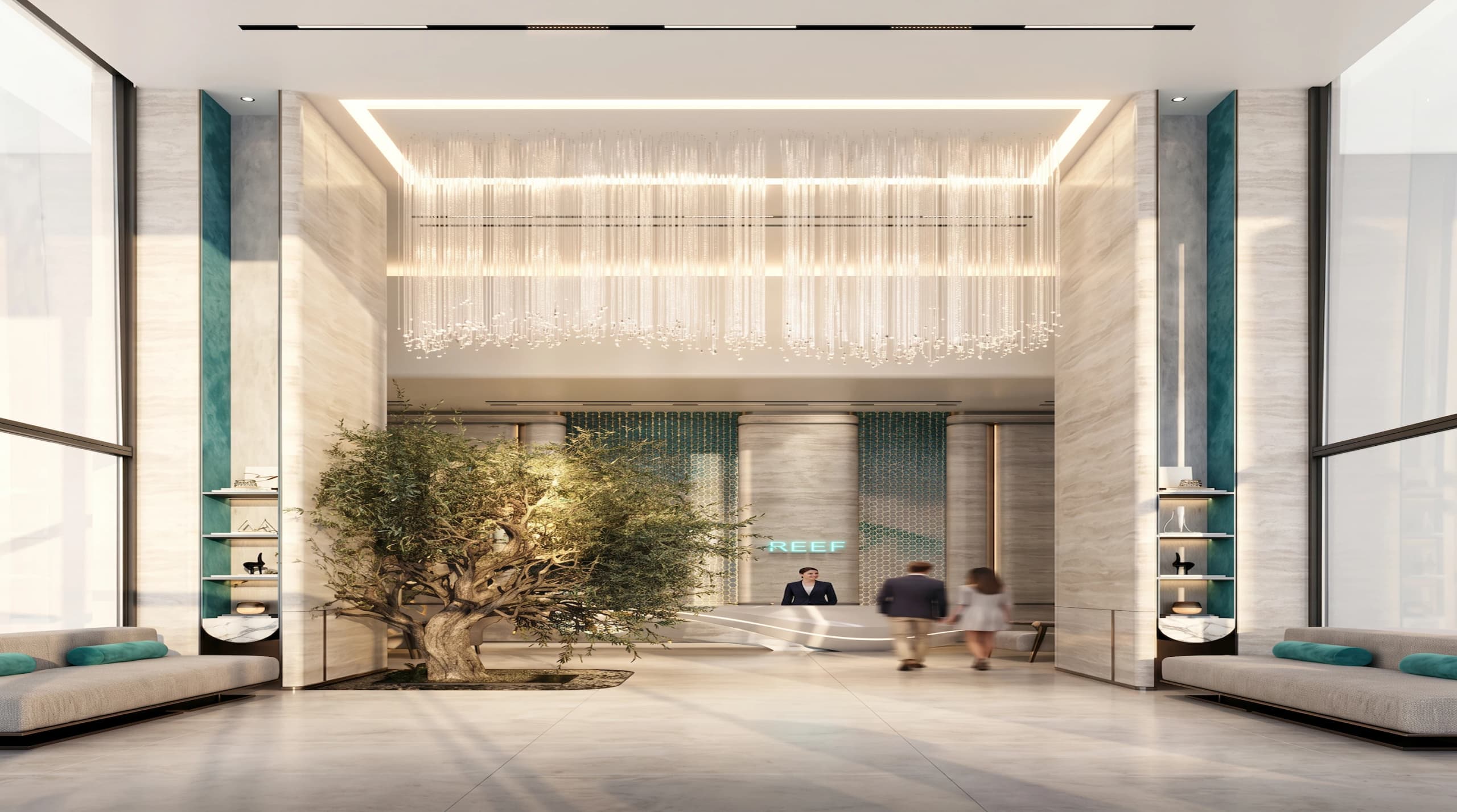 Double-height lobby with an olive tree, teal accents and a reception desk
