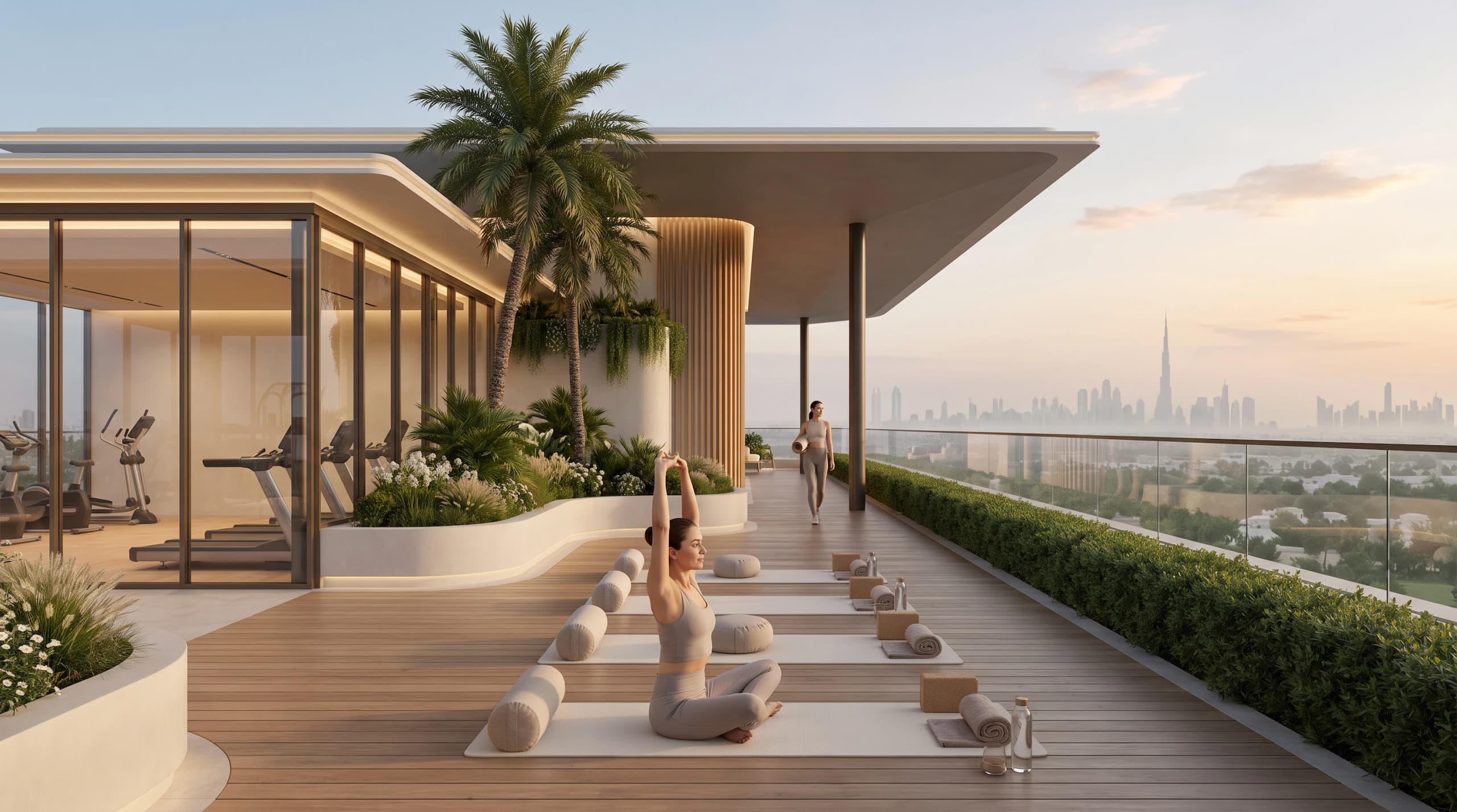 Rooftop yoga deck beside a gym, with a view over the city