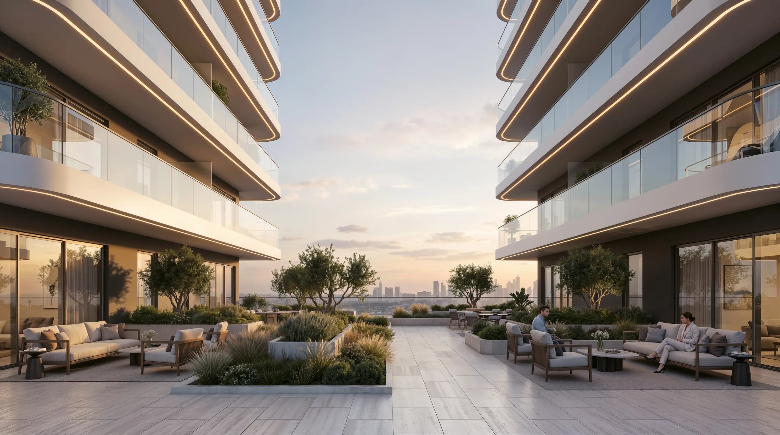 Landscaped podium courtyard with sofas and planting between two residential wings